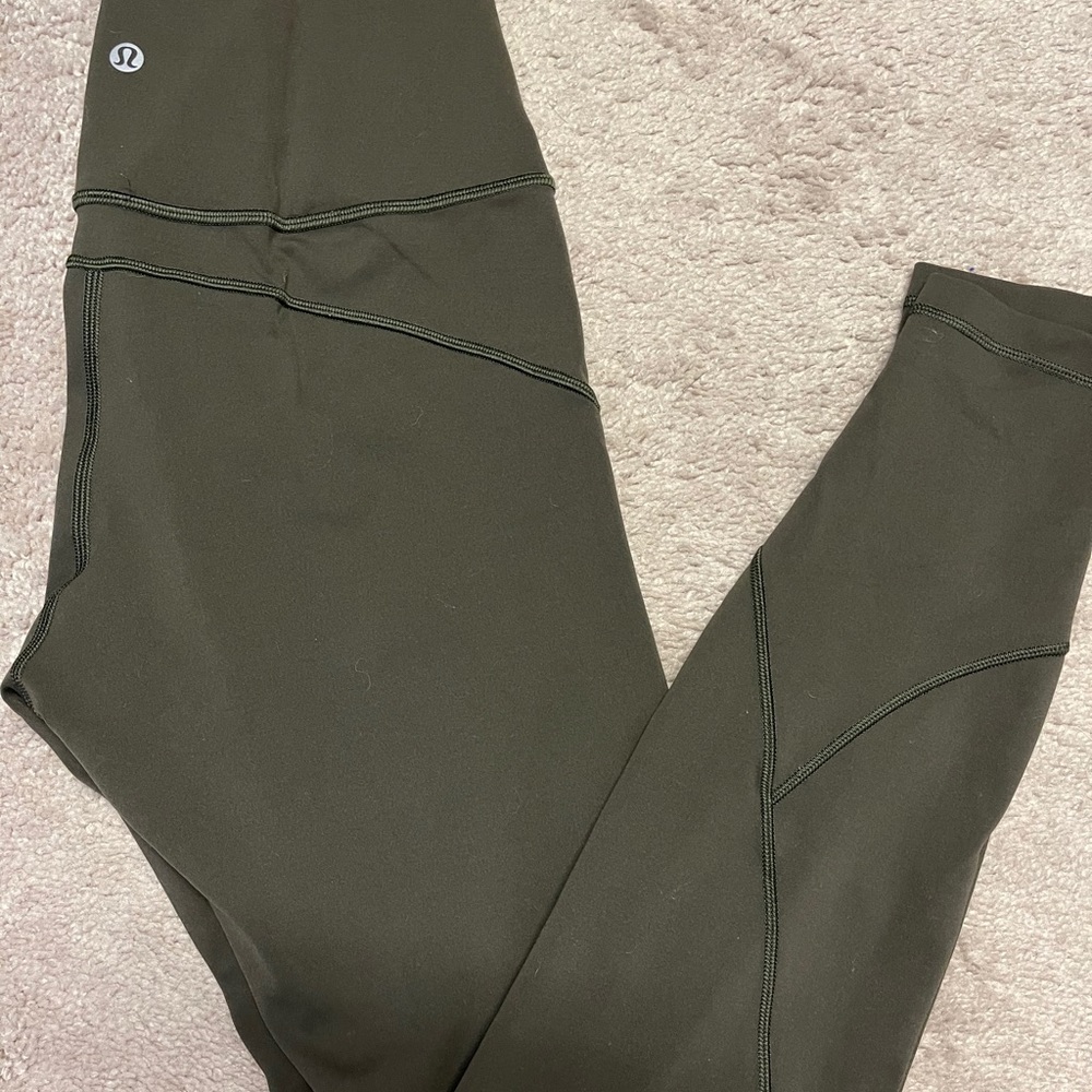 Size 8 dark green lululemon in movement leggings